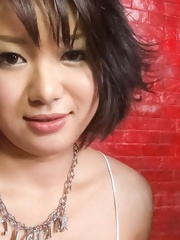 Haruka Uchiyama Asian licks hard cock and rubs it of hot cleavage