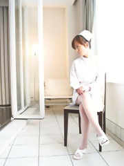 Japanese nurse Miina Minamoto alone and toying in a room