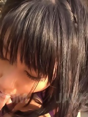 Megumi Haruka Asian with big nude boobs licks cock head outdoor